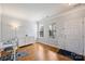 Bright living room featuring hardwood floors, a work space, and natural light from the windows at 3029 Allendale Dr, Fort Mill, SC 29707