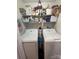 Laundry room with modern appliances and ample storage space at 303 Heritage Pkwy, Fort Mill, SC 29715