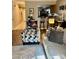 Living room with cozy seating, open to the kitchen, and plenty of natural light at 303 Heritage Pkwy, Fort Mill, SC 29715