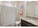 Bathroom with shower and tub combo, framed art, and granite countertop vanity at 305 Decanting Ln, Fort Mill, SC 29707