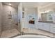 Relaxing bathroom showcasing a large tile shower and a glimpse into the primary bedroom at 305 Decanting Ln, Fort Mill, SC 29707