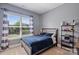 Cozy bedroom with large window allowing ample natural light and comfortable furnishings at 305 Decanting Ln, Fort Mill, SC 29707