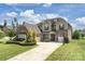 Beautiful two-story home with well-maintained landscaping and a two-car garage at 305 Decanting Ln, Fort Mill, SC 29707