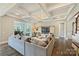 Spacious living room boasts coffered ceilings, hardwood floors, and a cozy atmosphere at 305 Decanting Ln, Fort Mill, SC 29707