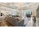 Open concept living room with wood floors, recessed lighting, and a view to the breakfast area at 305 Decanting Ln, Fort Mill, SC 29707