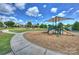 A playground with slides and a shade canopy and view of the picnic pavilion at 305 Decanting Ln, Fort Mill, SC 29707