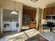 Functional kitchen featuring modern stainless steel appliances, ample cabinet space, and convenient access to laundry at 3898 Longwood Sw Dr, Concord, NC 28027