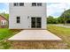 Concrete patio with large glass sliding doors that lead into the home at 424 Airline Ave, Shelby, NC 28150