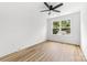 Bright bedroom with a ceiling fan, light wood flooring and a window view at 424 Airline Ave, Shelby, NC 28150