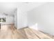 Neutral bedroom with wood-look floors, closet, and access to other rooms at 424 Airline Ave, Shelby, NC 28150