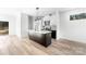 Modern kitchen boasting an island, quartz countertops, stainless appliances, and an open floor plan at 424 Airline Ave, Shelby, NC 28150