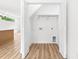 Walk-in laundry room with modern hookups, closet shelving, and natural light at 424 Airline Ave, Shelby, NC 28150