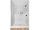 Shower with marble-look tile, a niche, and matte black hardware at 424 Airline Ave, Shelby, NC 28150