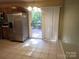 Eat-in kitchen featuring a stainless steel fridge and sliding glass door leading to deck at 4409 Homestead Rd, Rock Hill, SC 29732