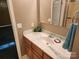 Bathroom vanity featuring light wood cabinets and a solid surface white countertop at 4409 Homestead Rd, Rock Hill, SC 29732
