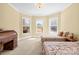 Bedroom with two twin beds and three windows for natural lighting and neutral decor at 458 Inverness Pl, Rock Hill, SC 29730