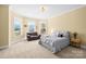 Bright bedroom with lots of natural light from the multiple windows and a sitting area at 458 Inverness Pl, Rock Hill, SC 29730