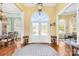 Bright foyer with hardwood floors, arched windows, and elegant chandelier at 458 Inverness Pl, Rock Hill, SC 29730