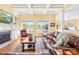 Comfortable living room with hardwood floors, a fireplace, and bright windows overlooking the lawn at 458 Inverness Pl, Rock Hill, SC 29730