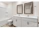 Bathroom features a double sink vanity and framed mirrors at 4623 Harris Elliot Rd, Lincolnton, NC 28092