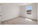Bright bedroom filled with natural light from a large window at 4623 Harris Elliot Rd, Lincolnton, NC 28092