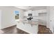 Kitchen features granite countertops, white cabinetry, stainless appliances, and a view to the yard at 4623 Harris Elliot Rd, Lincolnton, NC 28092