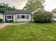 Charming single-story home with a yard and classic architectural details, ready for your personal touch at 520 Margaret Dr, Statesville, NC 28677