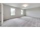Large bedroom featuring neutral decor, plush carpet and lots of natural light at 5305 Friendly Baptist Church Rd, Indian Trail, NC 28079