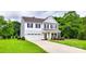 Charming two-story home with a two car garage and long driveway at 5305 Friendly Baptist Church Rd, Indian Trail, NC 28079