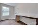 Laundry room has wood floors, a window and wire shelving at 5305 Friendly Baptist Church Rd, Indian Trail, NC 28079