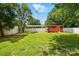 Large backyard enclosed by a white fence with a shed and well-maintained lawn at 604 Meadowbrook Rd, Kings Mountain, NC 28086