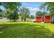 Expansive backyard features a shed and a white fence for privacy at 604 Meadowbrook Rd, Kings Mountain, NC 28086