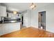 Hardwood floors and a view of the kitchen in the dining room at 604 Meadowbrook Rd, Kings Mountain, NC 28086