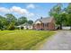 Charming brick home with a well-maintained lawn and a convenient driveway at 604 Meadowbrook Rd, Kings Mountain, NC 28086