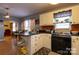 Open kitchen area with a breakfast bar and views to the living space at 604 Meadowbrook Rd, Kings Mountain, NC 28086