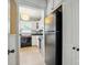 Efficient kitchen with a black refrigerator and modern appliances at 604 Meadowbrook Rd, Kings Mountain, NC 28086