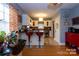 Charming kitchen with white cabinets, breakfast bar, and stainless steel appliances at 604 Meadowbrook Rd, Kings Mountain, NC 28086