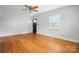 Unfurnished living room featuring hardwood floors, a window, and a door at 604 Meadowbrook Rd, Kings Mountain, NC 28086