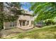 View of the backyard showcasing a deck, siding, and a trampoline at 6434 Skyline Dr, Charlotte, NC 28269