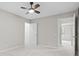 Bedroom with neutral walls, a ceiling fan, and carpeted floors at 6434 Skyline Dr, Charlotte, NC 28269