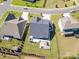 An aerial view of a house, playground and backyard in a well-planned community at 7112 Irongate Dr, Indian Land, SC 29707
