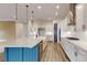 Bright, eat-in kitchen boasts a large island, stainless appliances, and ample storage at 7112 Irongate Dr, Indian Land, SC 29707