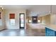 Open-concept living room features a fireplace, lots of natural light, and seamless flow to kitchen at 7112 Irongate Dr, Indian Land, SC 29707