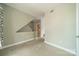 Hallway leading to bathroom featuring neutral walls and beige carpet at 738 Garden District Dr, Charlotte, NC 28202