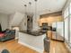 Stylish kitchen featuring stainless steel appliances, granite counters, and hardwood floors at 738 Garden District Dr, Charlotte, NC 28202