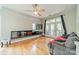 Living room featuring hardwood floors, modern fireplace, and access to outdoor patio at 738 Garden District Dr, Charlotte, NC 28202