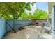 Private brick patio with grill, swing and wood fence at 738 Garden District Dr, Charlotte, NC 28202