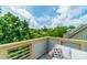 Balcony view with outdoor seating showcasing city skyline and lush greenery at 738 Garden District Dr, Charlotte, NC 28202