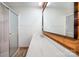 Updated bathroom featuring a glass door shower, modern sink, and updated hardware at 8464 Robinson Church Rd, Charlotte, NC 28215