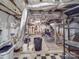 Unfinished basement space with exposed ductwork and a checkered floor at 907 Edgewood Cir, Gastonia, NC 28052